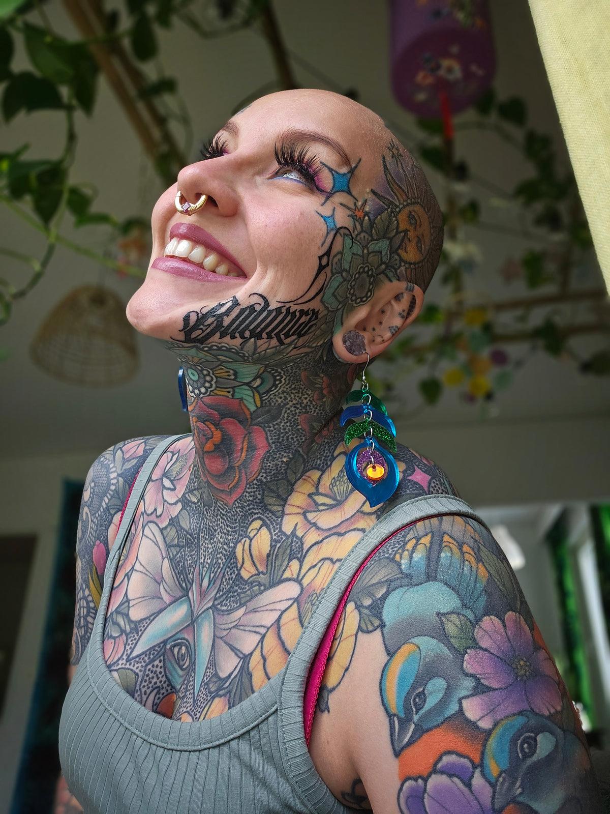 Riikinkukko Korvakorut