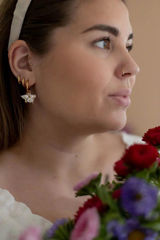 Livia korvakorut, Kulta