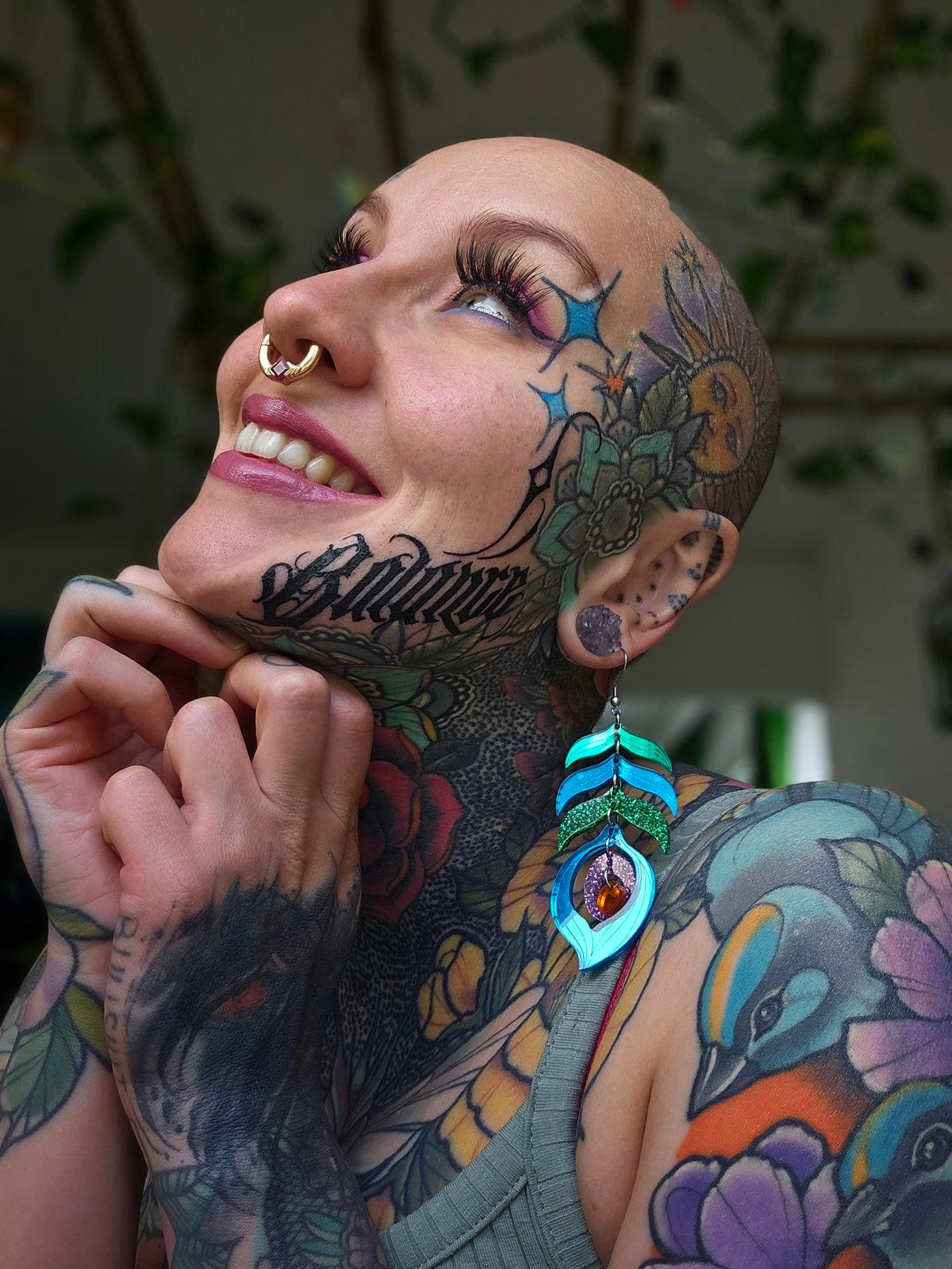 Riikinkukko Korvakorut