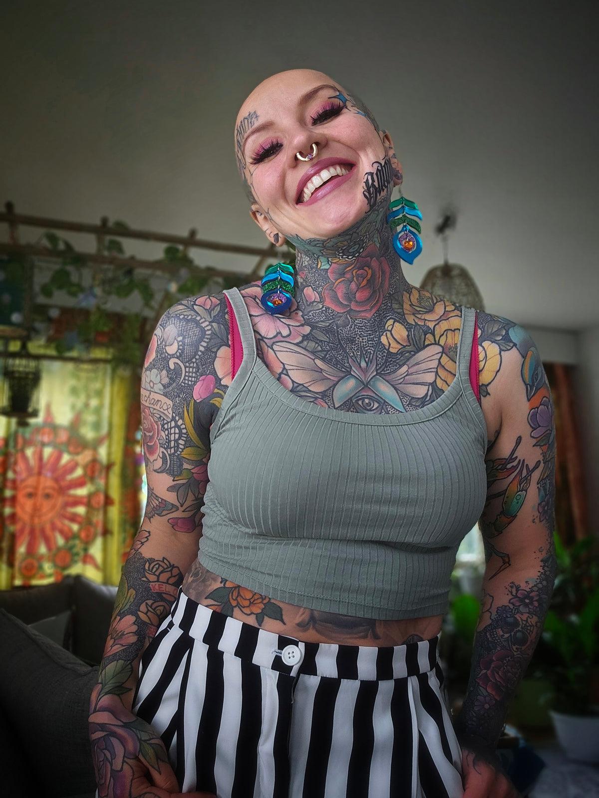 Riikinkukko Korvakorut