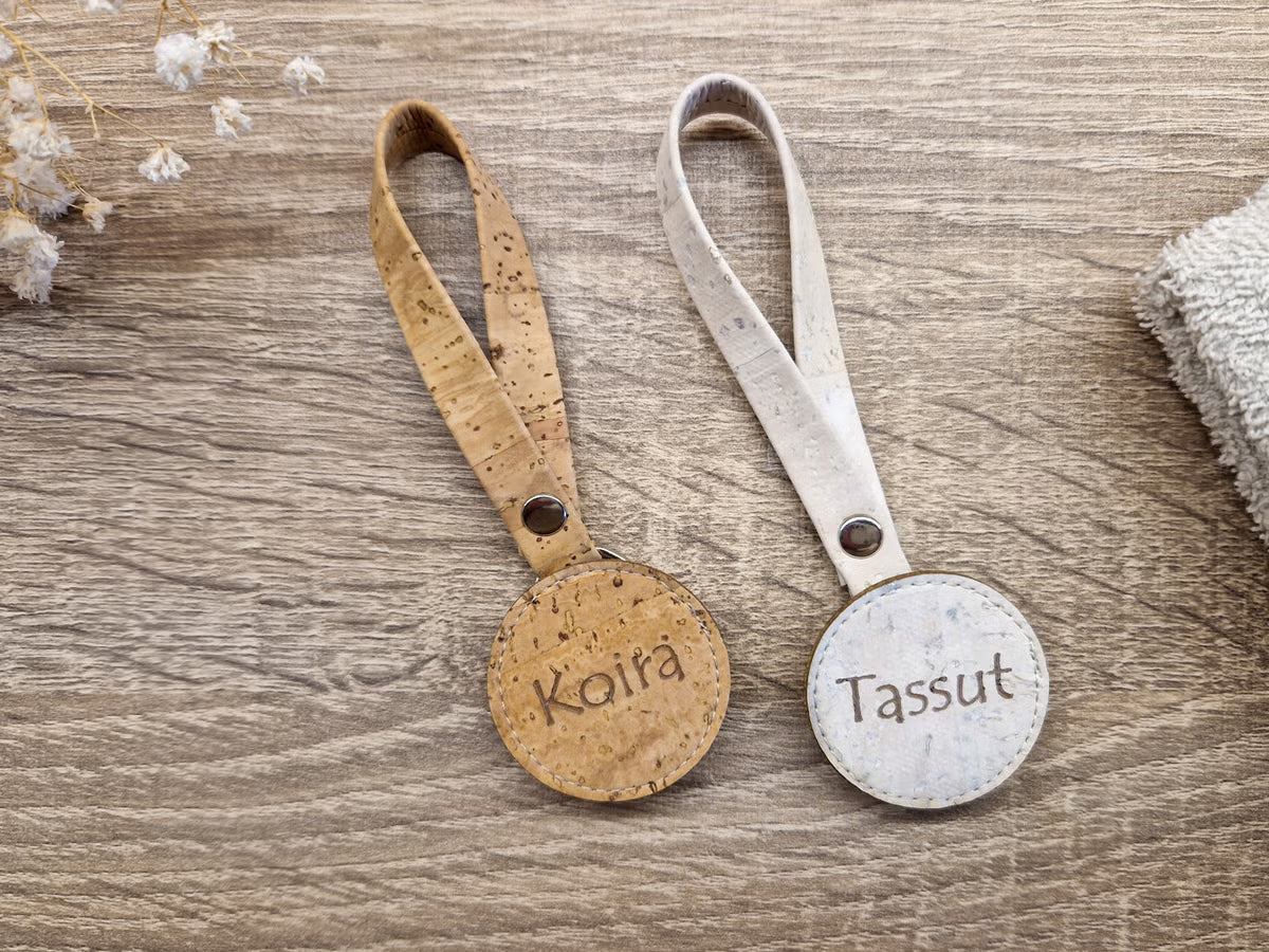 Pyyheripustin tekstillä