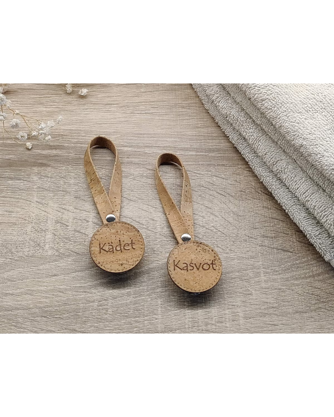 Pyyheripustin tekstillä