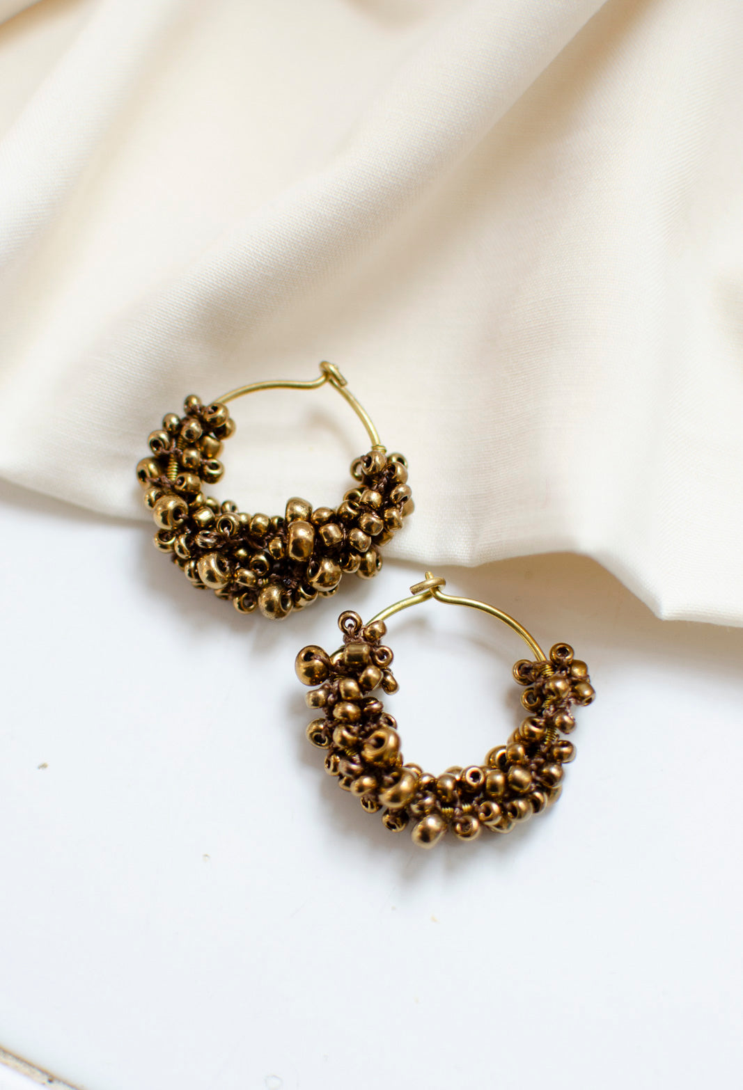 Heena korvakorut, Brass