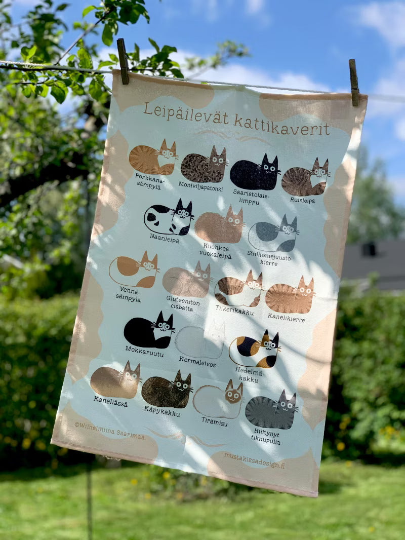 Lepäilevät kattikaverit keittiöpyyhe